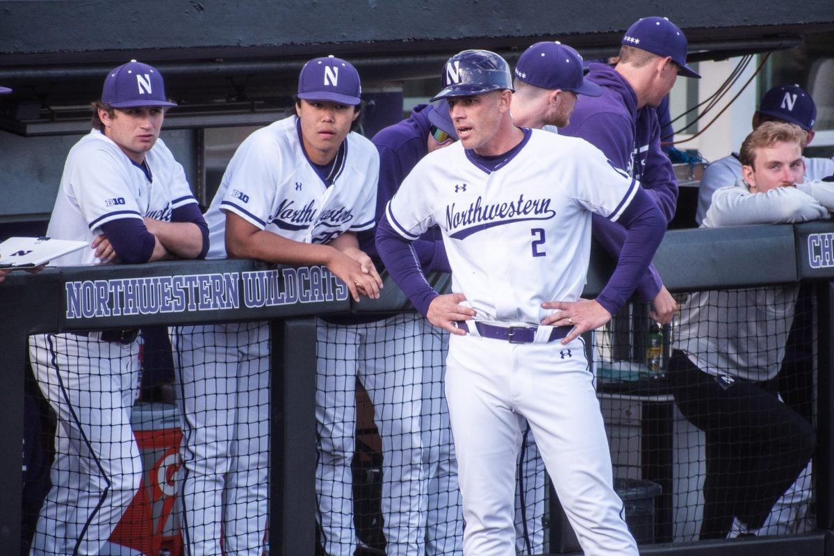 Coach Ben Greenspan talks with players during a game against Illinois State Tuesday.