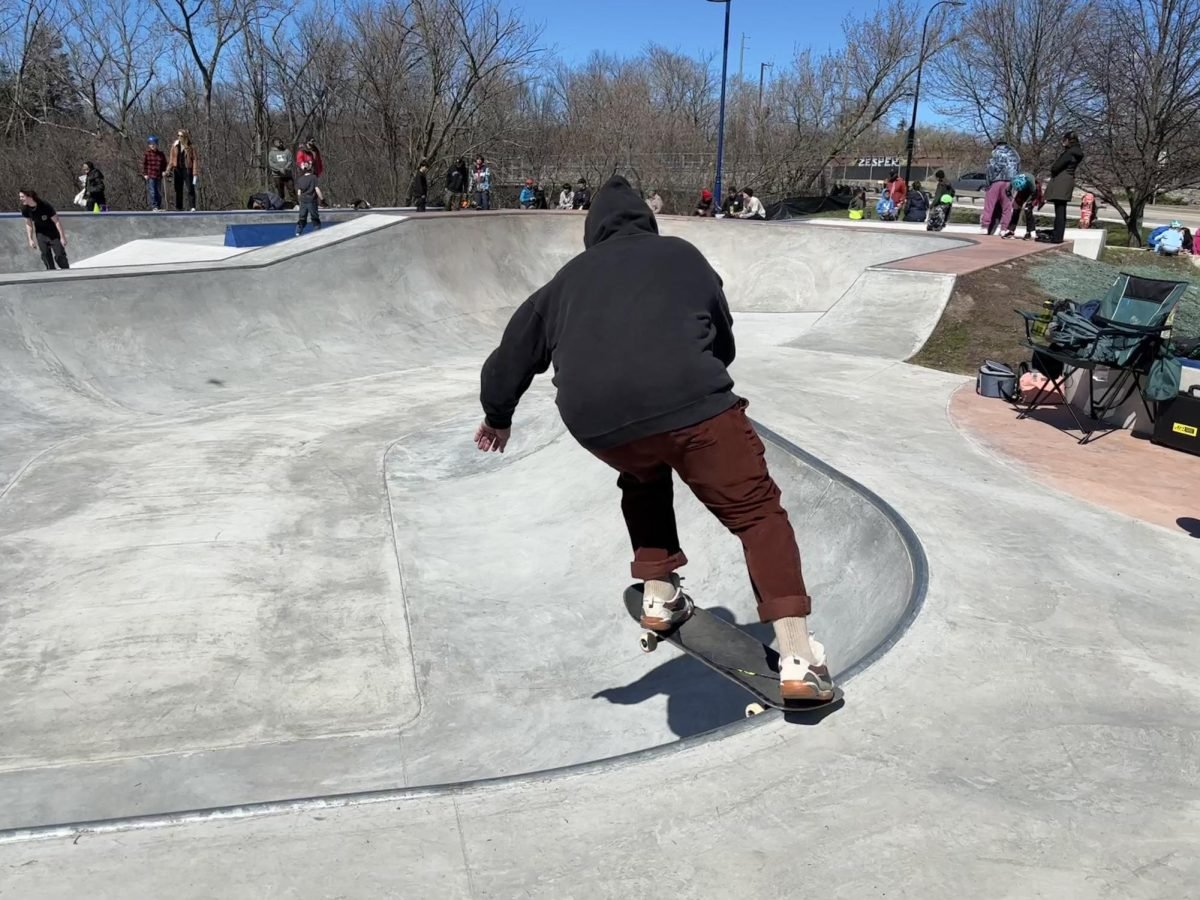 A skater descends into Evanston Skate Park