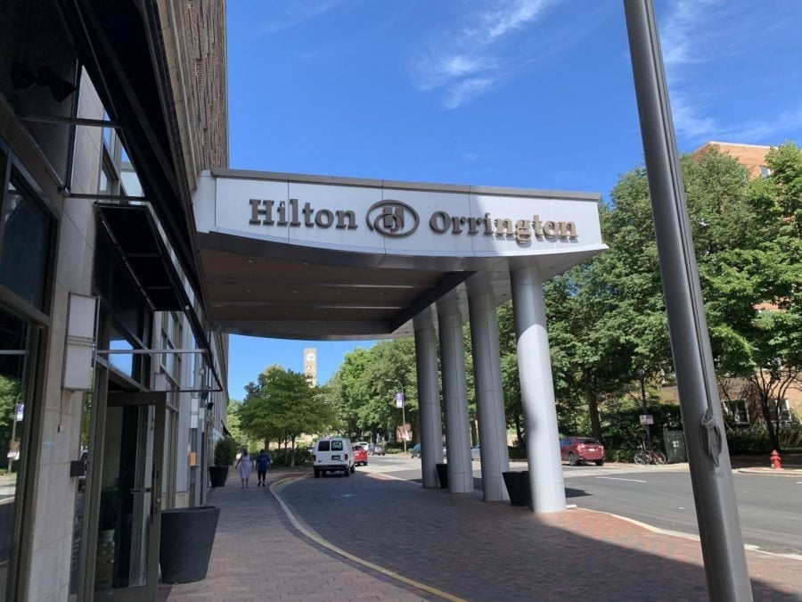 A hotel entrance with Hilton Orrington written on it.