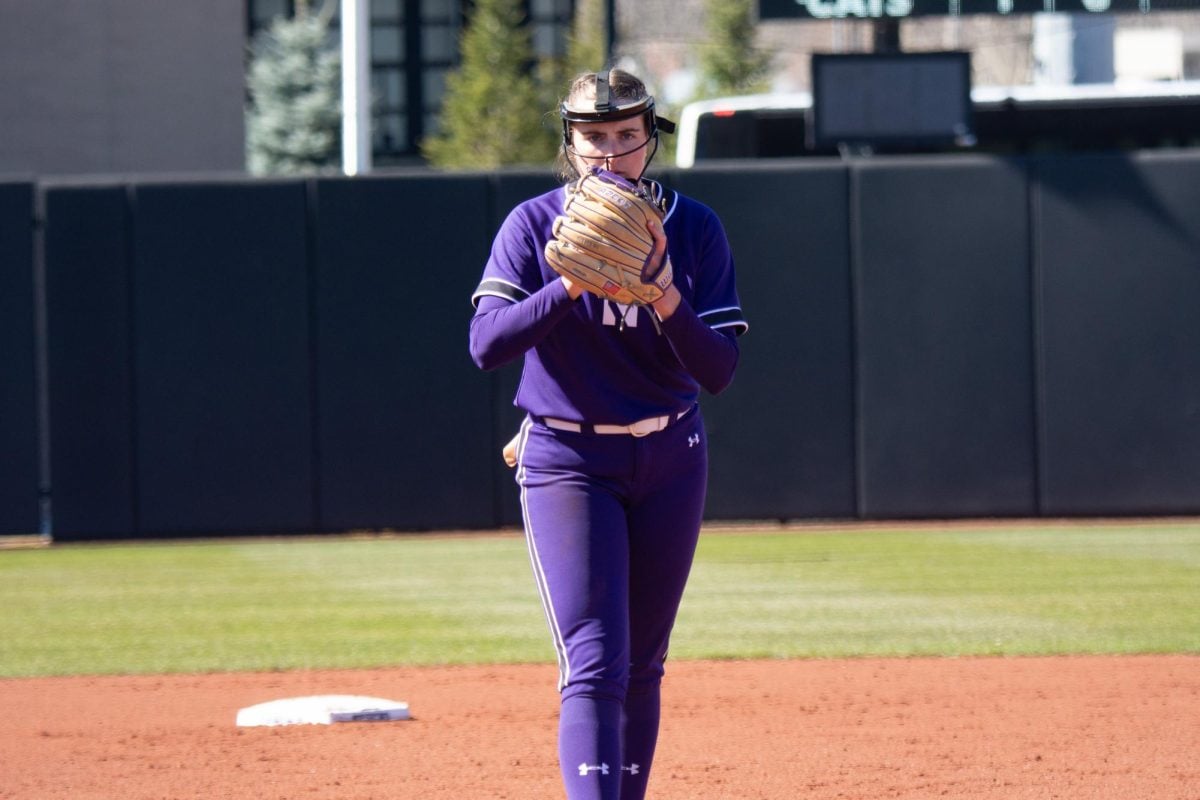 Graduate+student+pitcher+Ashley+Miller+winds+up+for+a+pitch.+Miller+pitched+in+all+three+games+at+Purdue%2C+earning+two+wins+and+her+fifth+complete-game+shutout+of+the+season.