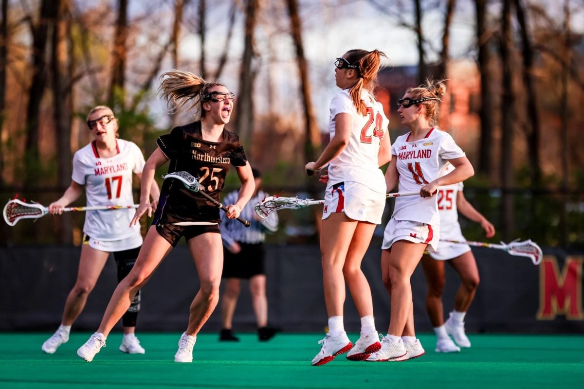 Sophomore attacker Madison Taylor celebrates against Maryland Saturday night. Taylor scored six goals during Northwestern’s 17-9 victory over the Terrapins.