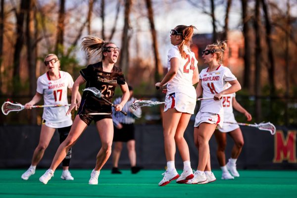 Sophomore attacker Madison Taylor celebrates against Maryland Saturday night. Taylor scored six goals during Northwestern’s 17-9 victory over the Terrapins.