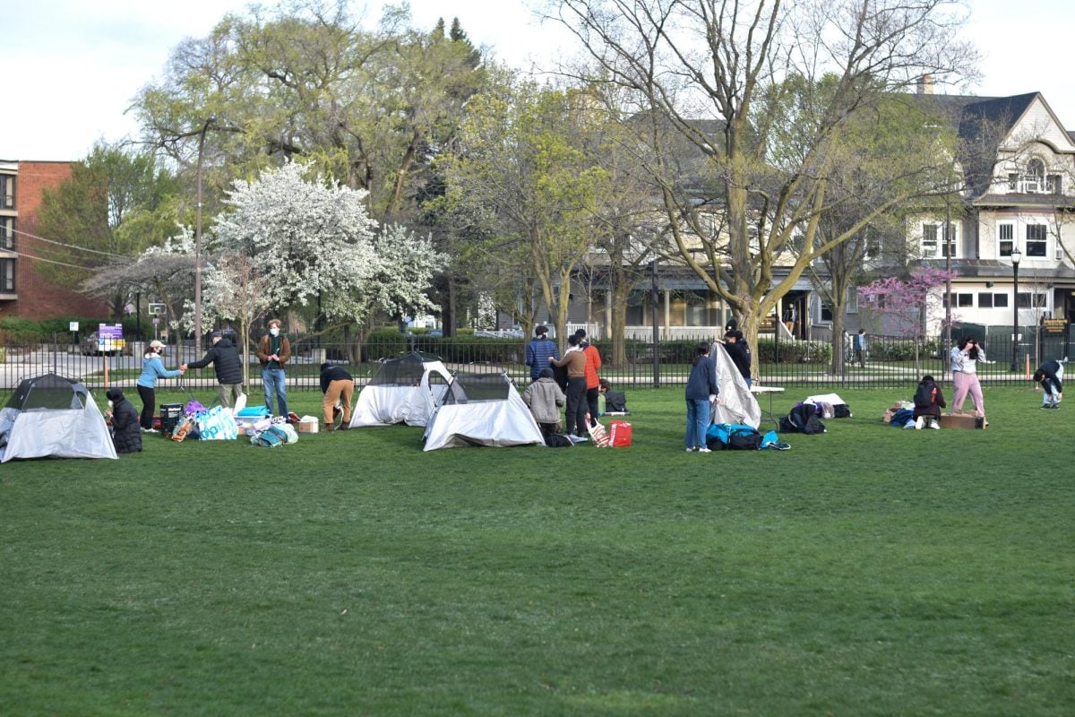 Protesters began setting up tents on Deering Meadow at around 7 a.m. Thursday.
