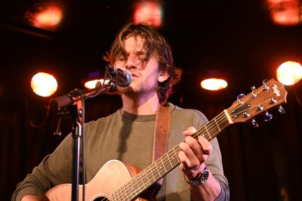 Jonah Kagen performed heartfelt acoustic music with passion at Beat Kitchen on April 15. 