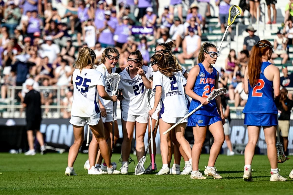 Northwestern celebrates a goal against Florida on Friday. The Wildcats booked a second consecutive national title game against No. 2 Boston College with their 15-11 win.