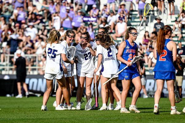 Northwestern celebrates a goal against Florida on Friday. The Wildcats booked a second consecutive national title game against No. 2 Boston College with their 15-11 win.
