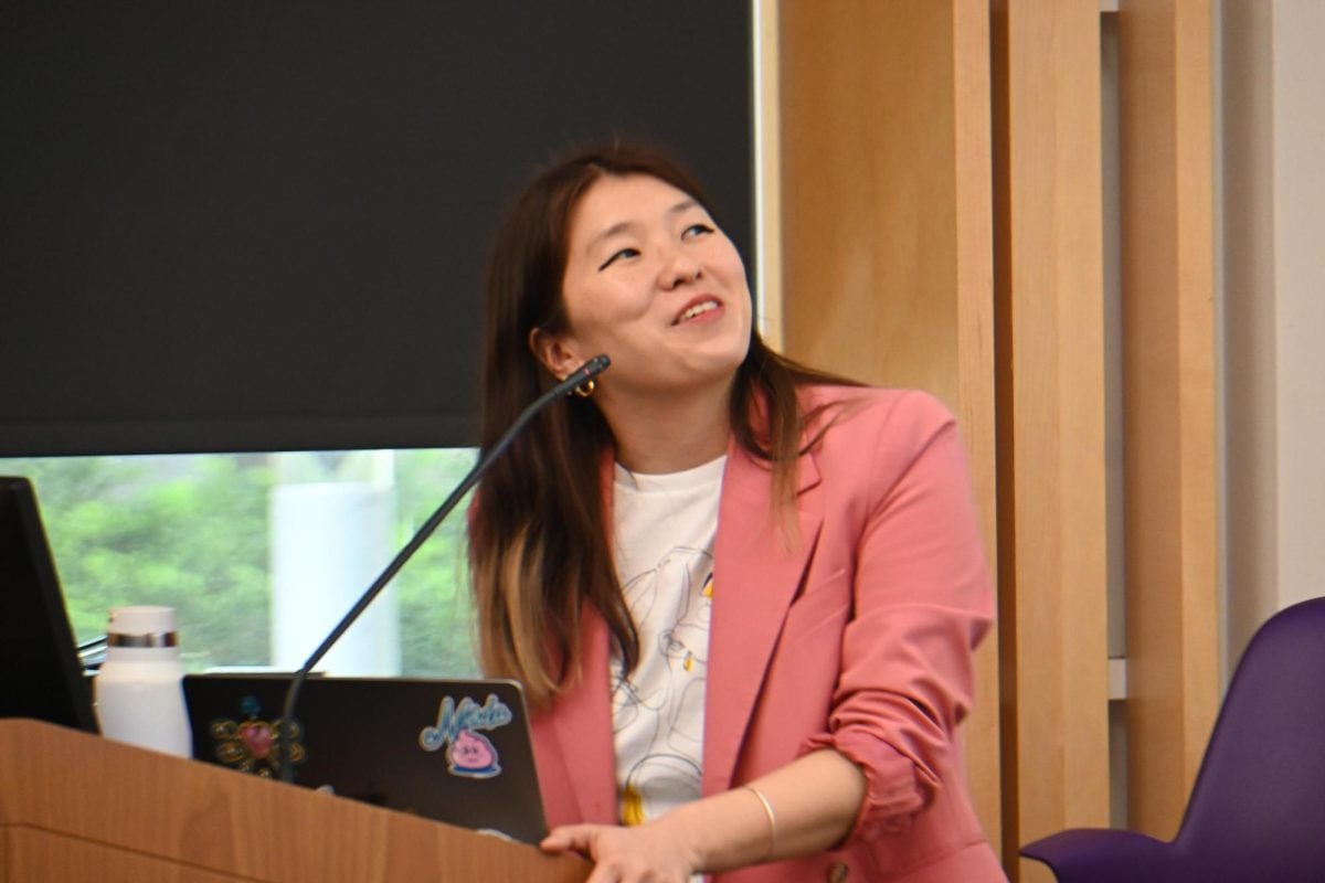 Author Quan Zhou spoke about her experiences growing up in Spain on Thursday.
