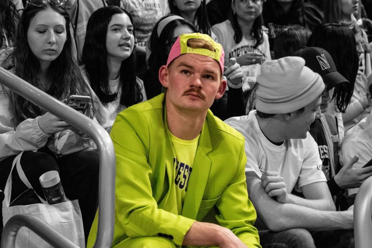 McLain gained fame at NU after wearing a neon suit to the ‘Cats Retro Night basketball game against Maryland Jan. 17.