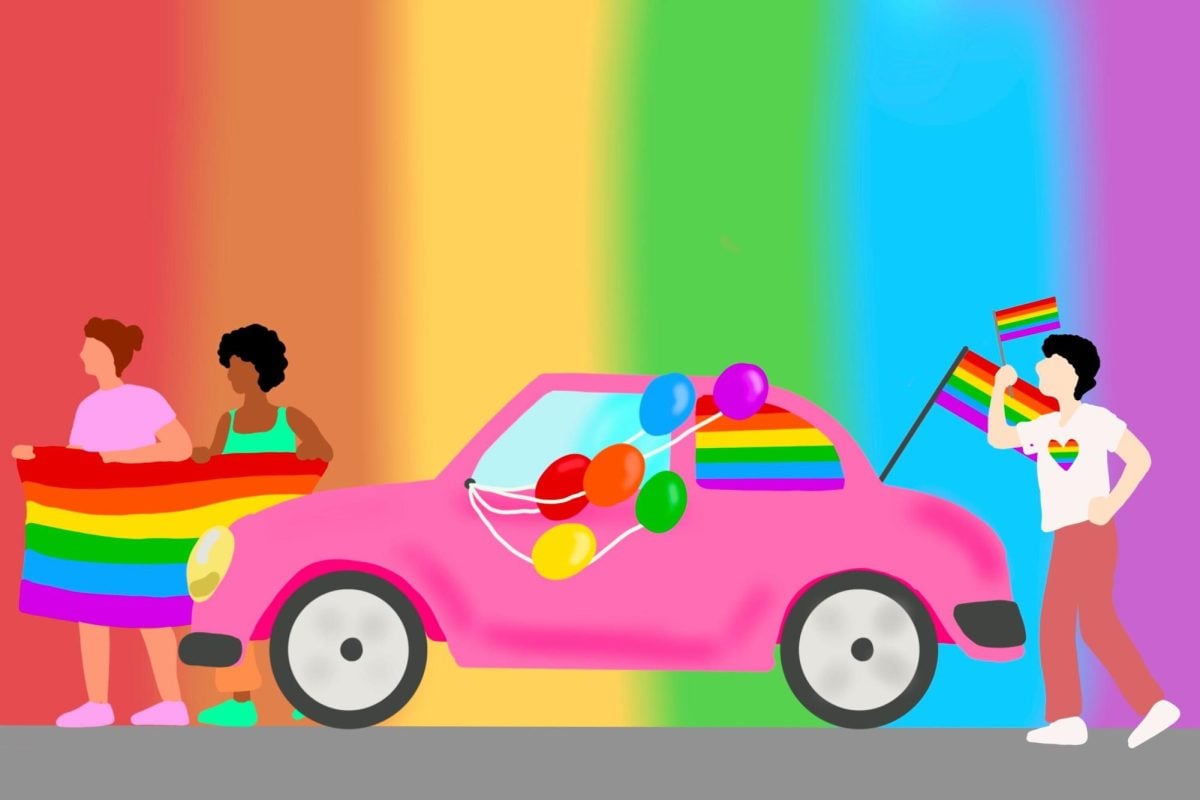 A rainbow car with three people wearing multi-colored clothing and holding balloons.