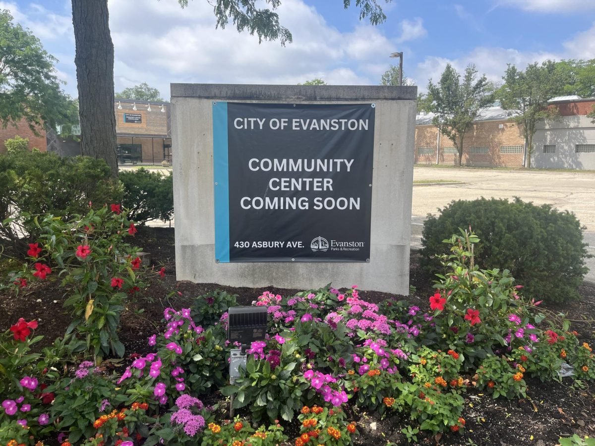 A “coming soon” sign on the corner of Asbury Avenue and Oakton Street advertises the opening of Evanston’s newest community center. 