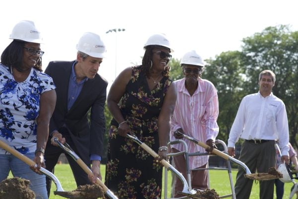 The groundbreaking gave community members integral to the 5th Ward School, now Foster School, the chance to “break ground,” fitted with hard hats and shovels. 
