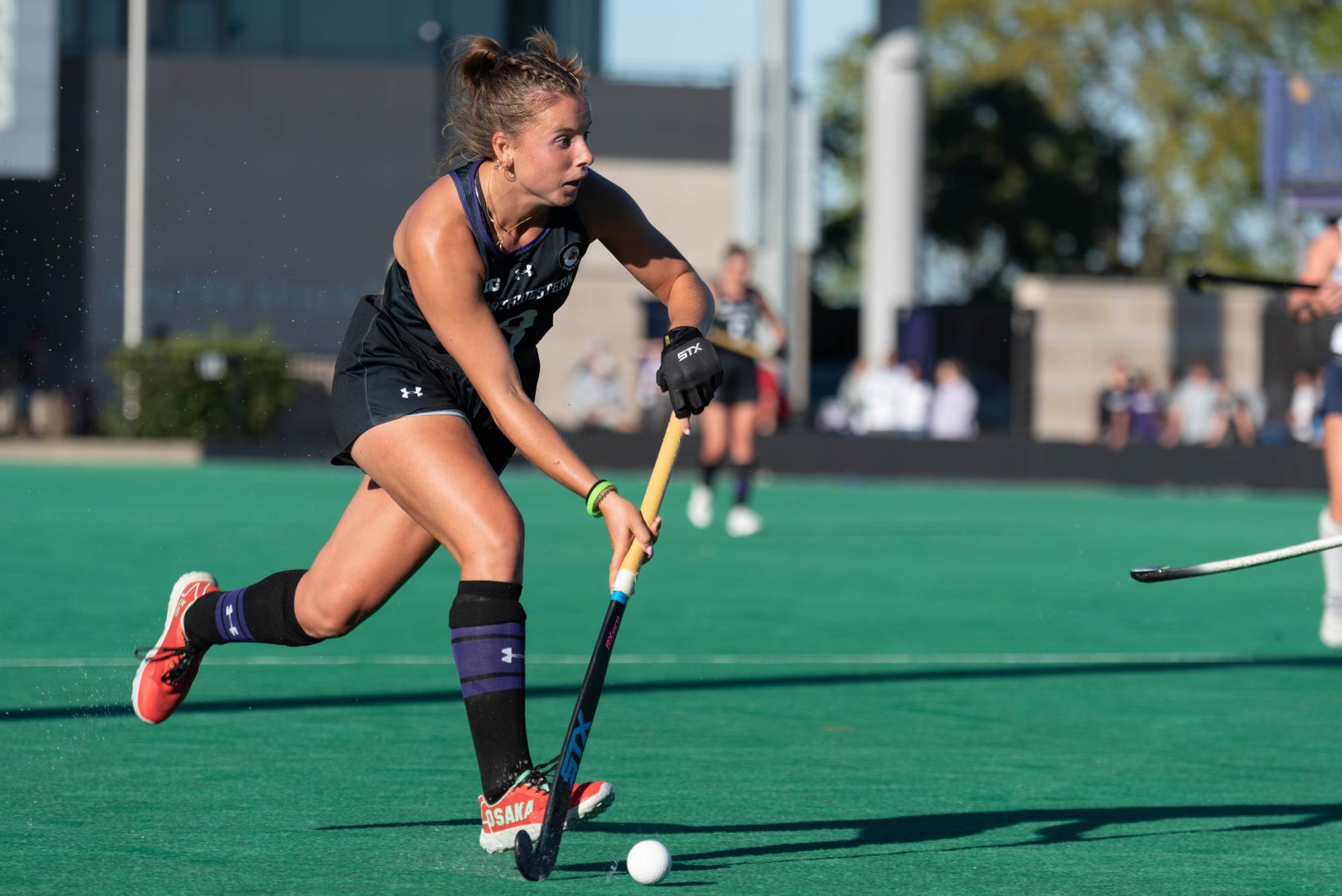 Midfielder Maddie Zimmer dribbles the ball in a regular season game against Penn State in 2022.