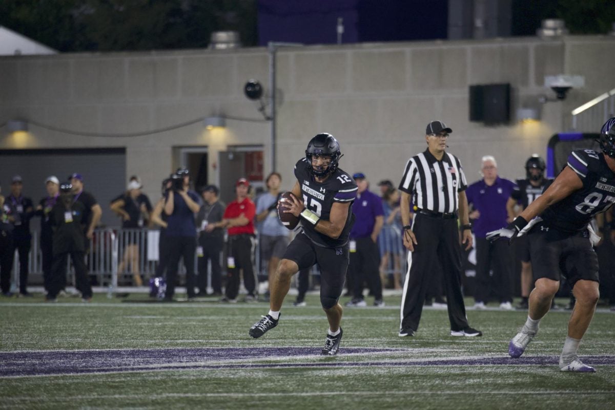 Redshirt sophomore quarterback Jack Lausch scrambles during last Saturday's Eastern Illinois game.