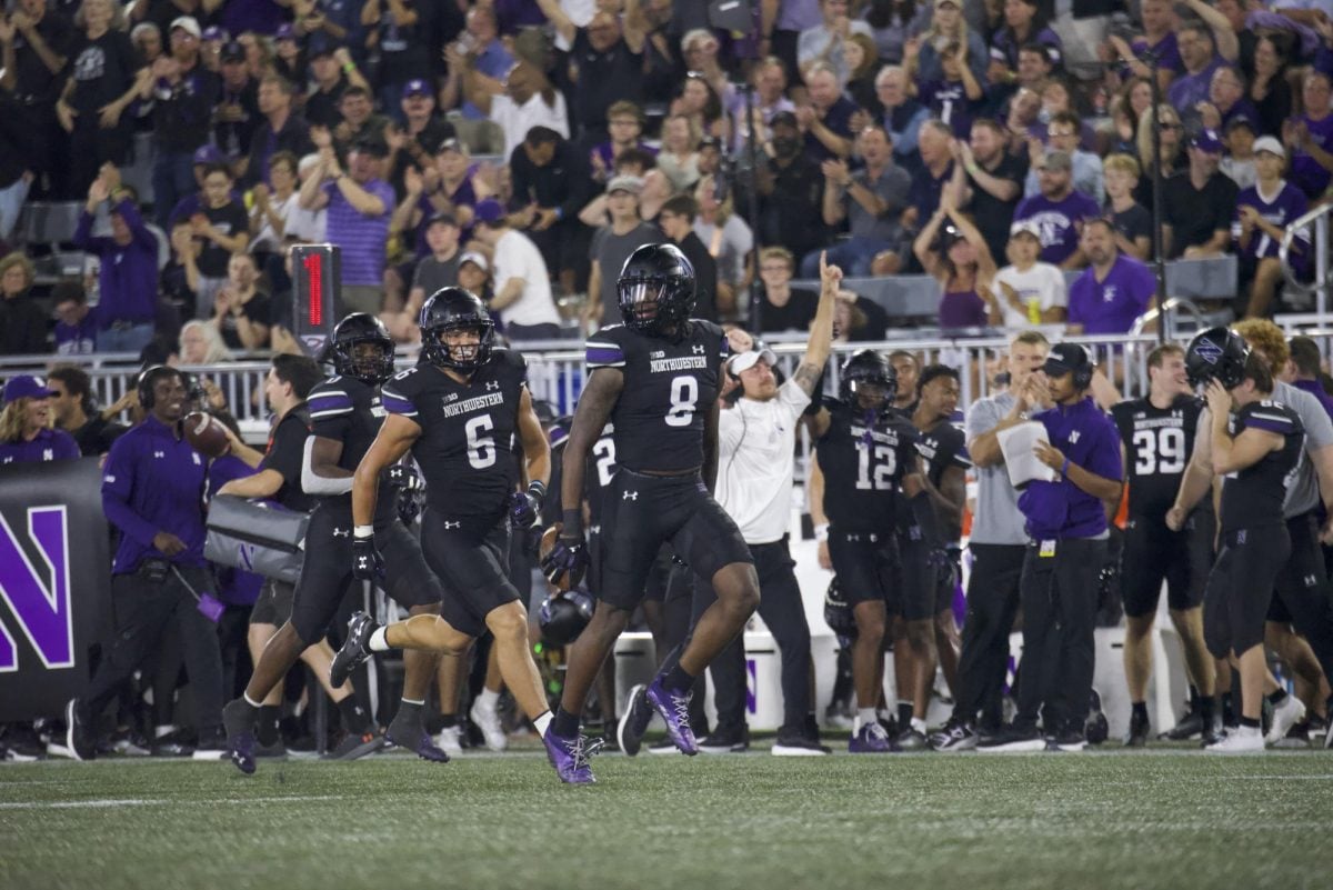 Junior safety Devin Turner celebrates his interception against Eastern Illinois Saturday night.