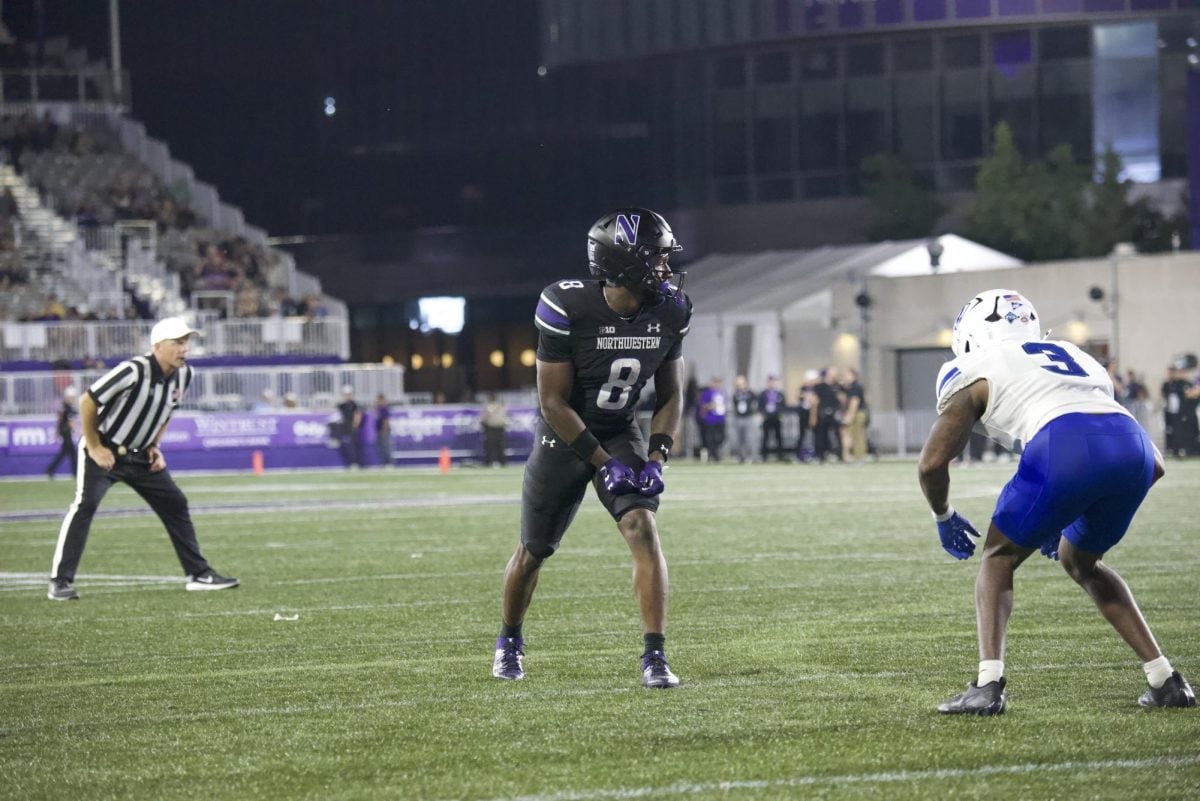 Graduate student wide receiver A.J. Henning gets set at the line of scrimmage against Eastern Illinois Saturday night. Henning hauled in a career-high 117 receiving yards in the victory over the Panthers.