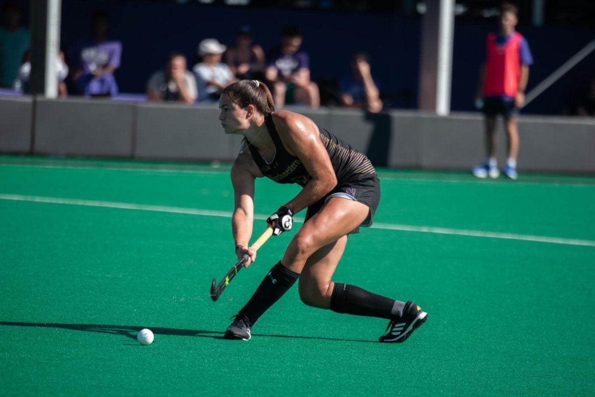 Sophomore back Ilse Tromp strikes the ball against No. 4 Iowa Friday. Tromp helped Northwestern secure its seventh shutout of the season against Indiana Sunday.
