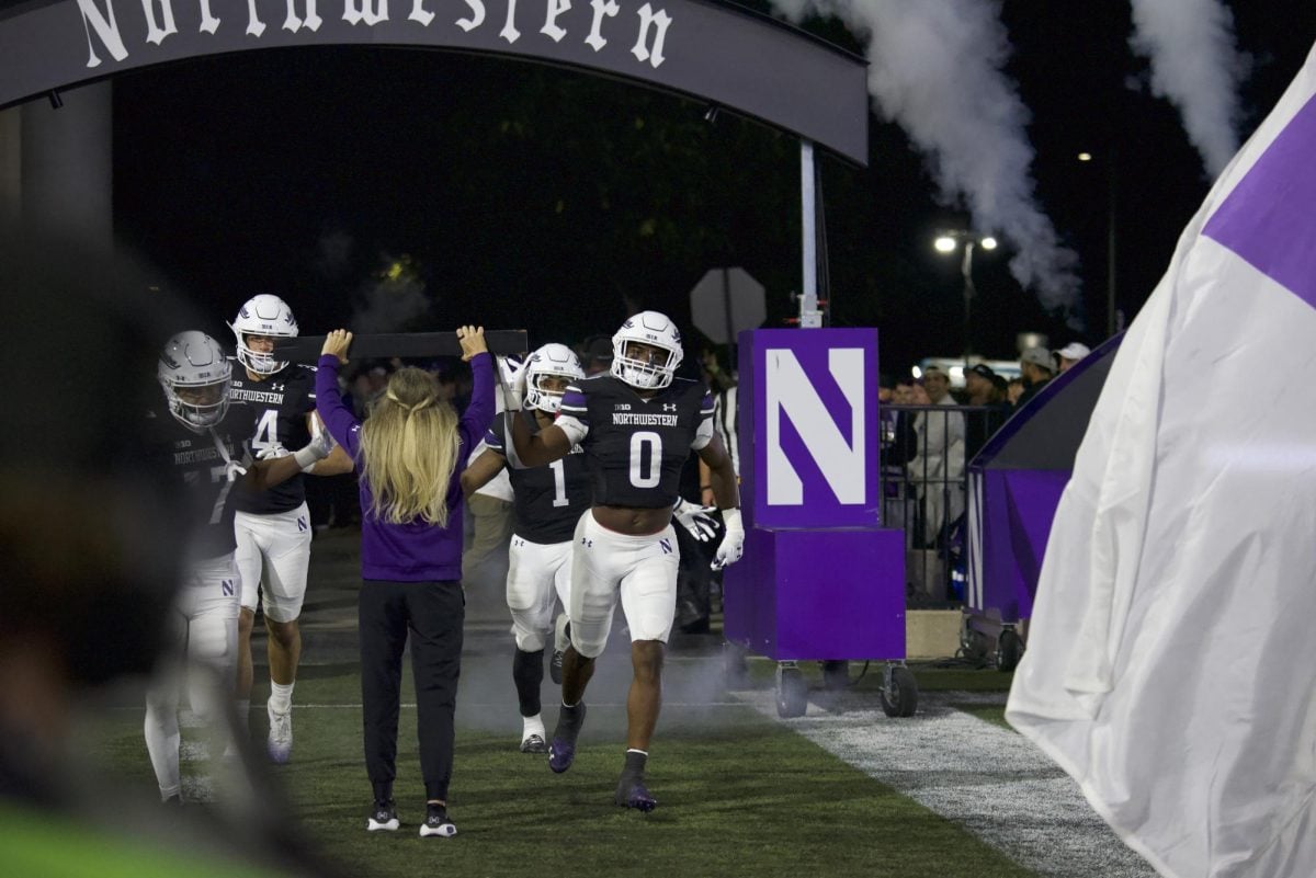 Northwestern's captains enter the field ahead of Sept. 7's Duke game.