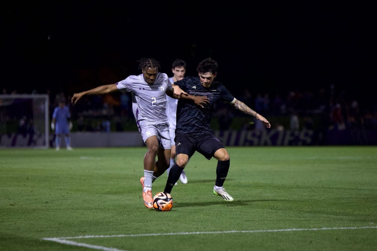 Graduate student defender Brandon Clagette presses up the field against Washington Friday night.