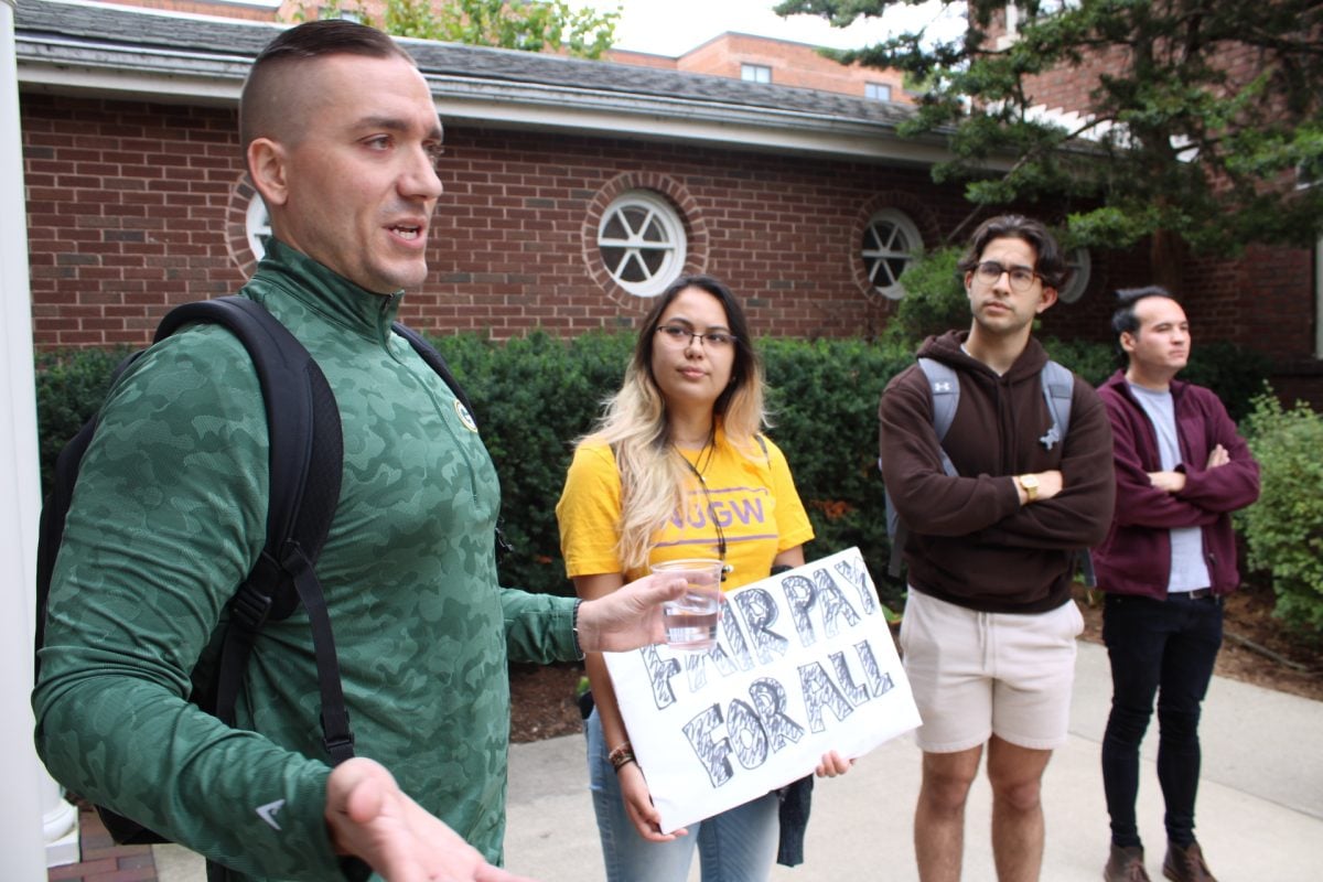 Sixth-year political science Ph.D. candidate Brian Key spoke about his loss of University funding outside Weinberg Dean Adrian Randolph’s office Friday.