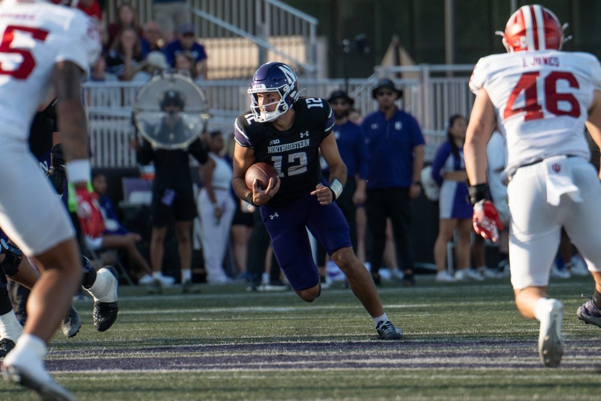 Redshirt sophomore quarterback Jack Lausch scrambles against Indiana on Oct. 5.