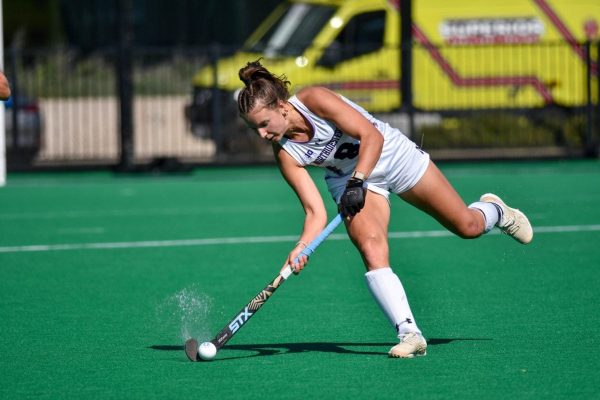 Senior midfielder Maddie Zimmer dribbles the ball against Penn State. 