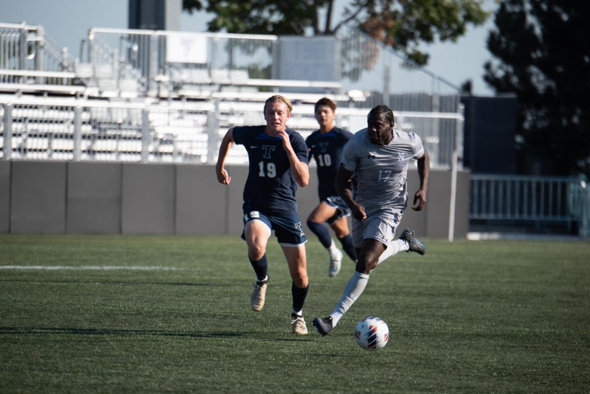 Redshirt senior forward Akinjide Awujo in a game earlier this season. Awujo scored the eventual winner in Northwestern's clash with Rutgers Friday.