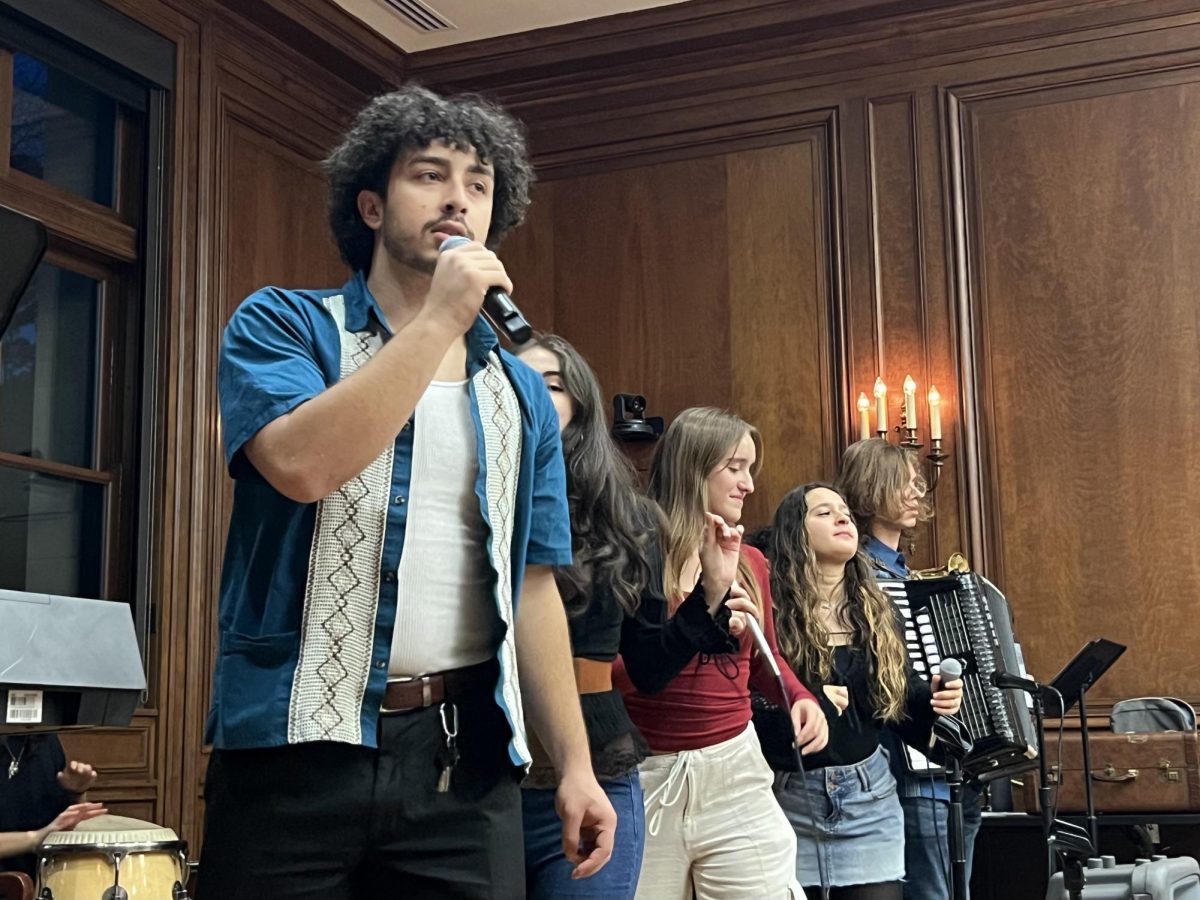 Latin Music Ensemble vocalists sing during their performance in Harris Hall Wednesday.