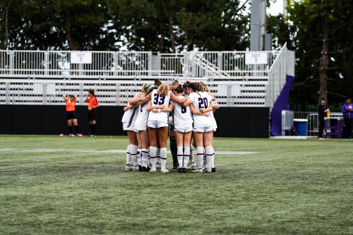 Northwestern huddles during a game earlier this season.