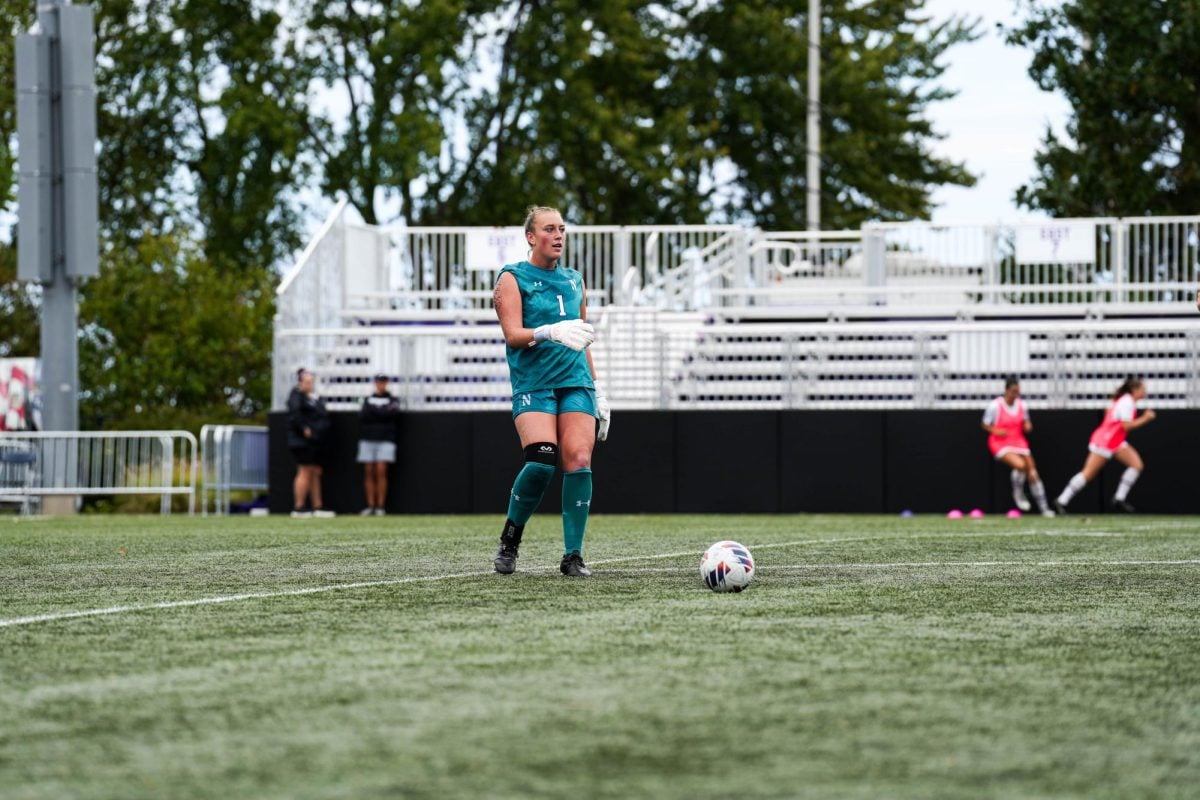 Junior goalkeeper Reiley Fitzpatrick in a game earlier this season. Fitzpatrick made a career-high eight saves Sunday. 