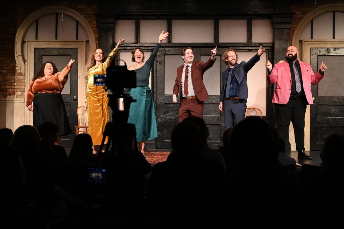 From left to right: improv actors Kristen Aviles, Bri Fitzpatrick, Cynthia Bangert, Bruce Phillips, James Dugan and Alonso Ramirez take their bows after the Oct. 10 show of “Clued In: An Invitation to Die For.”