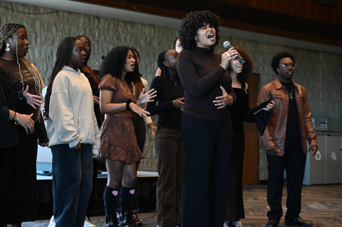 Group of a capella singers performing a song