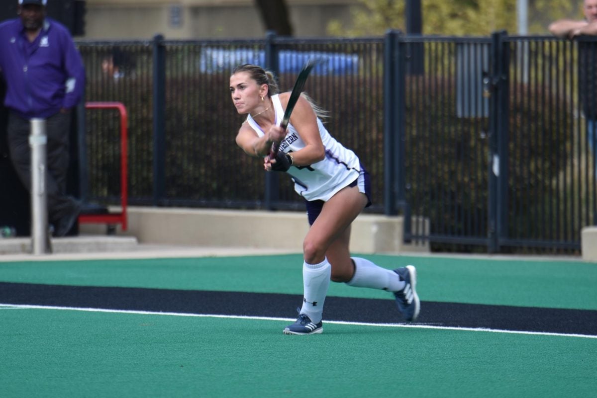 Sophomore forward Ashley Sessa takes a penalty corner. Sessa scored her team-high 13th  in NU's win Sunday