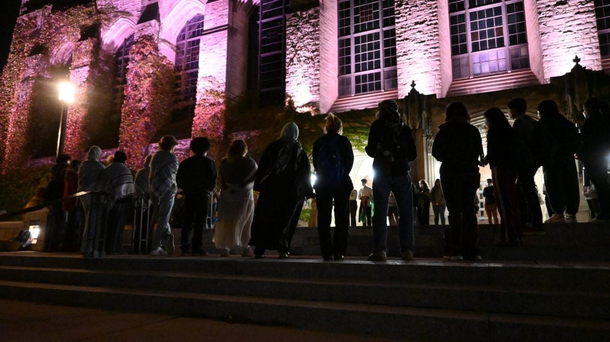 Roughly 35 students gathered in front of Deering Library on Sunday for the vigil.