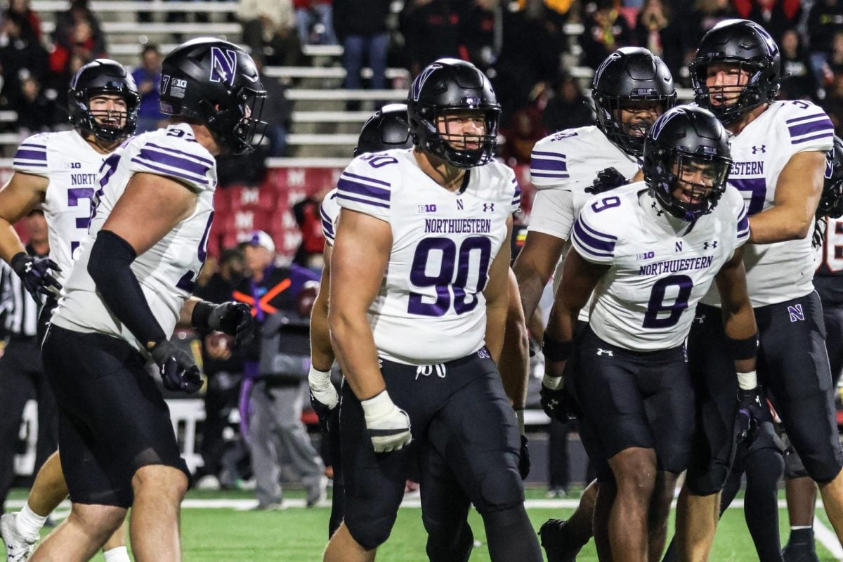 Redshirt junior defensive tackle Carmine Bastone celebrates a strip sack against Maryland Friday night. Bastone made his first appearance of the season in the 37-10 victory.