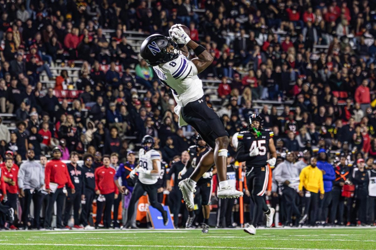 Graduate student wide receiver A.J. Henning hauls in a 40-yard reception against Maryland Friday night.