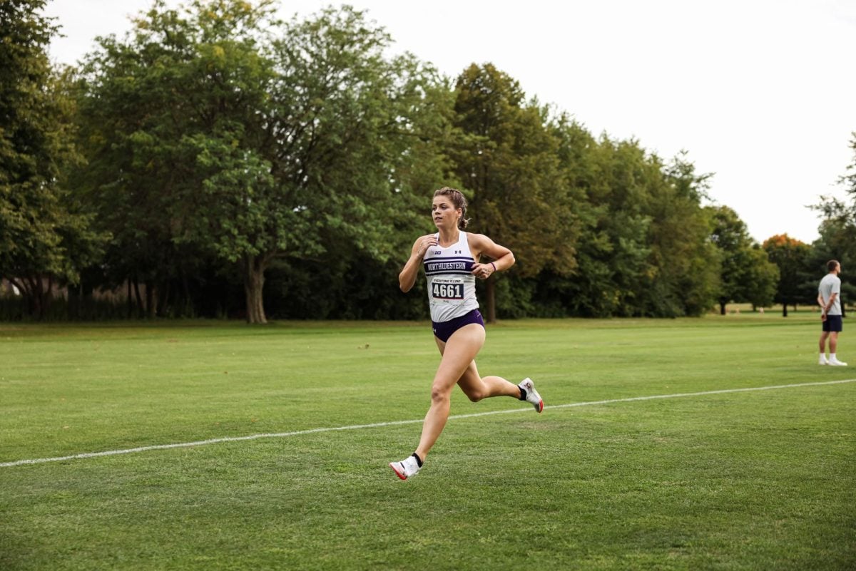 Senior Ava Earl runs in a race earlier this season.