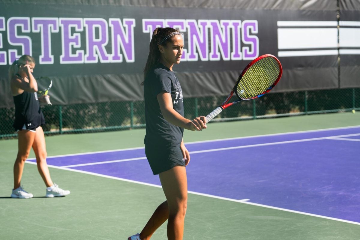 Freshman Maia Loureiro at a practice this fall. She won all three singles matches she competed in this past weekend.