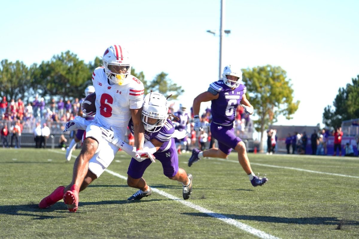 Redshirt junior cornerback Theran Johnson attempts to make a tackle against Wisconsin Saturday. 