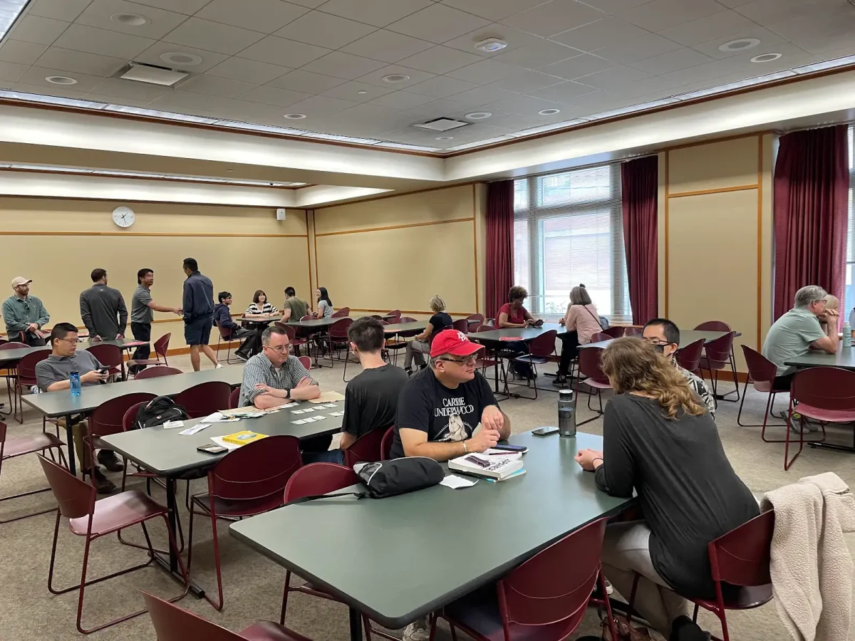  Attendees of the Evanston Public Library’s Language Cafe engage in conversation in a variety of languages. The Language Cafe is hosted in the library’s community meeting room on the second Saturday of each month.  
