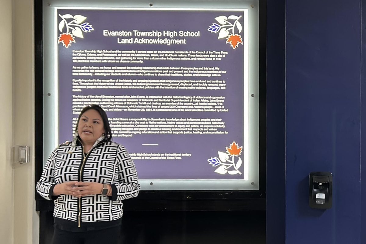 Graphic designer Eva Oldman designed ETHS’ land acknowledgement, which is displayed by the school’s entrance. 
