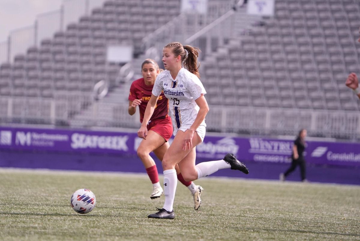 Freshman forward Alex Fallon dribbles downfield against USC Sunday. The ’Cats lost, 2-1. 