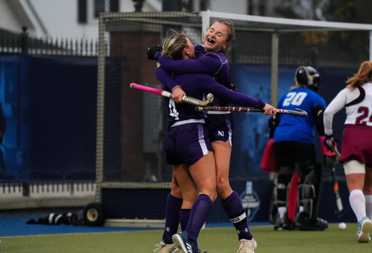 Sophomore forward Ashley Sessa and senior midfielder Maddie Zimmer celebrate after scoring the game-winning goal for Northwestern.