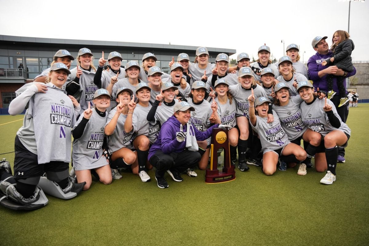 Northwestern poses with the national championship trophy following Sunday's 5-0 victory over Saint Joseph's.