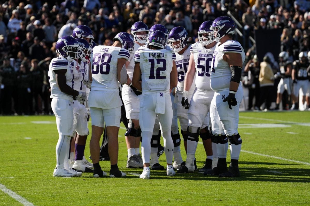 Northwestern huddles ahead of an offensive play against Purdue on Nov. 2.