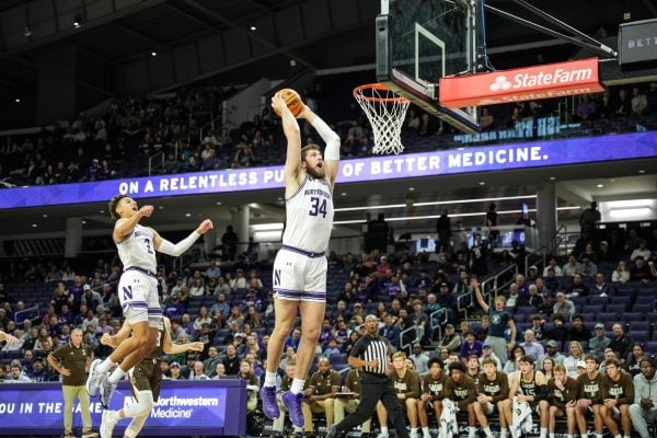 Graduate student center Matthew Nicholson slams home a dunk against Lehigh Monday.