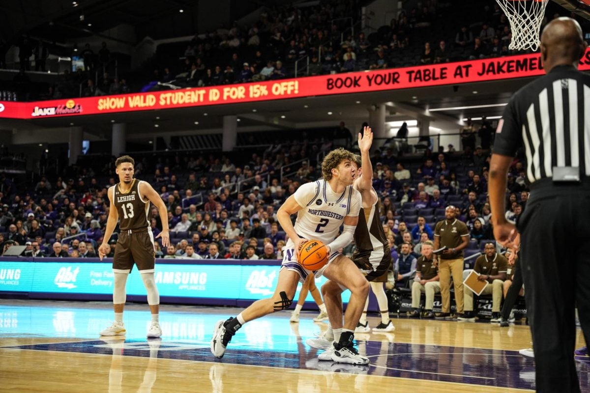 Junior forward Nick Martinelli drives to the basket against Lehigh earlier this season. 