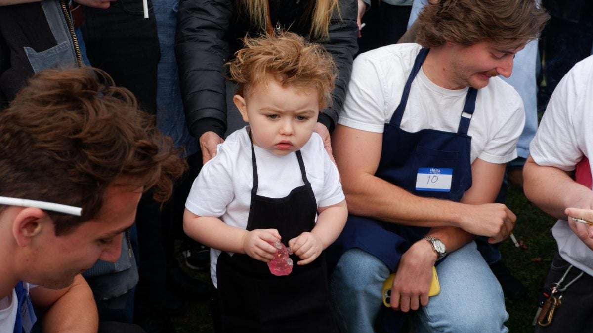 Massimo Morelli, the youngest contestant, looks out into the crowd while surrounded by other Jeremy Allen White look-alikes.
