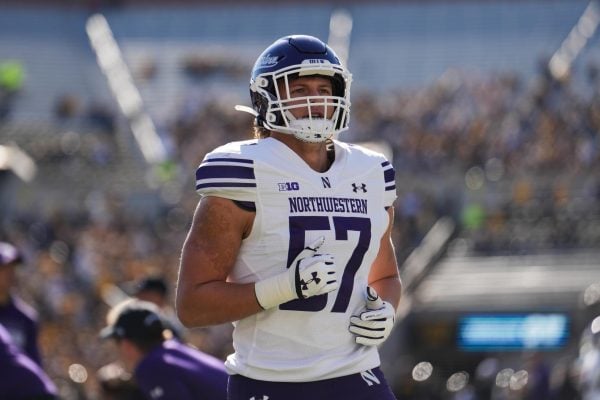 Graduate student linebacker Greyson Metz warms up ahead of Northwestern’s game against Iowa on Oct. 26. Metz has tallied 33 total tackles this season.