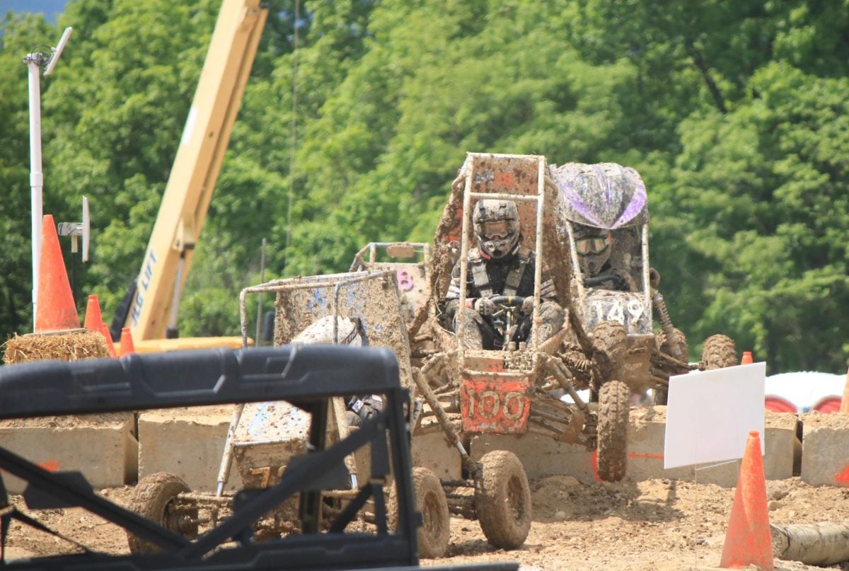 The Motorcats race through the mud against teams from other universities. 