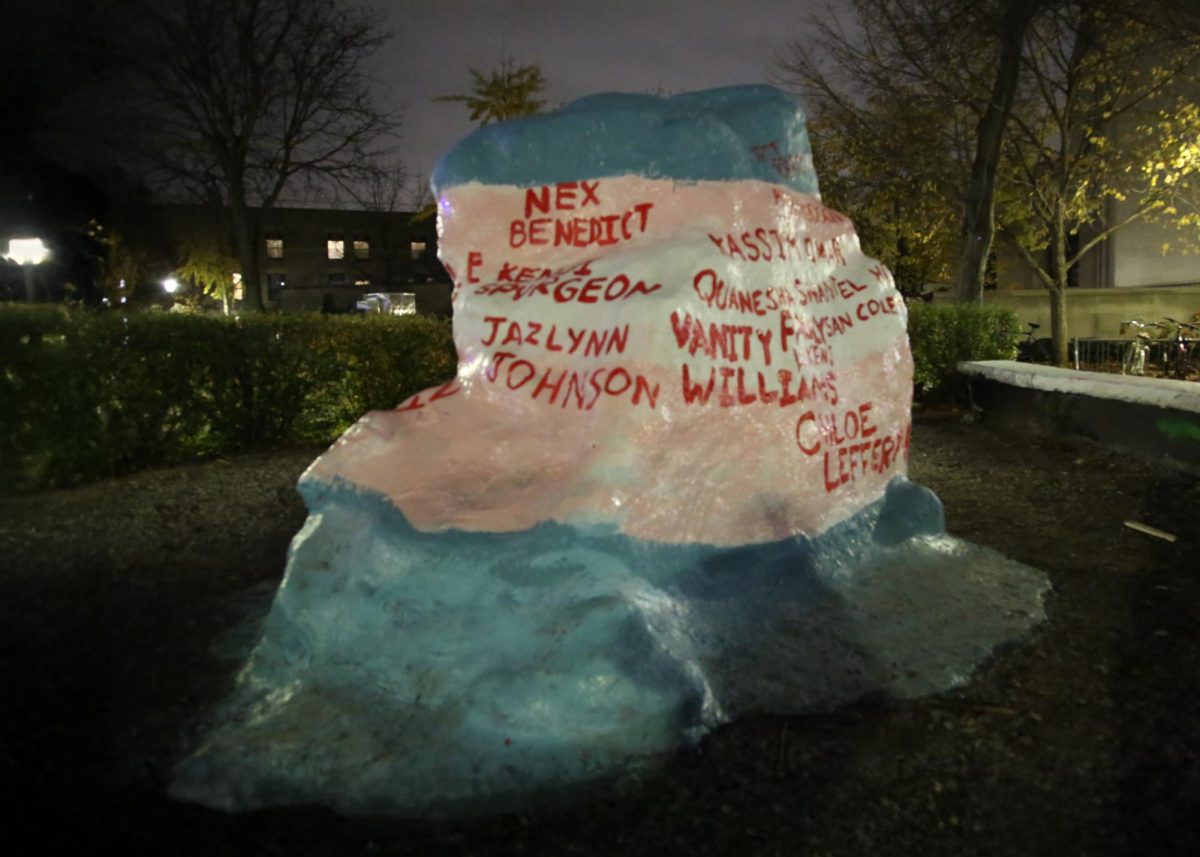 Northwestern Society of Transgender and Non-Binary Students painted The Rock the colors of the transgender flag with the names of more than 30 transgender individuals whose lives were “taken through violent means,” according to the Human Rights Campaign. 